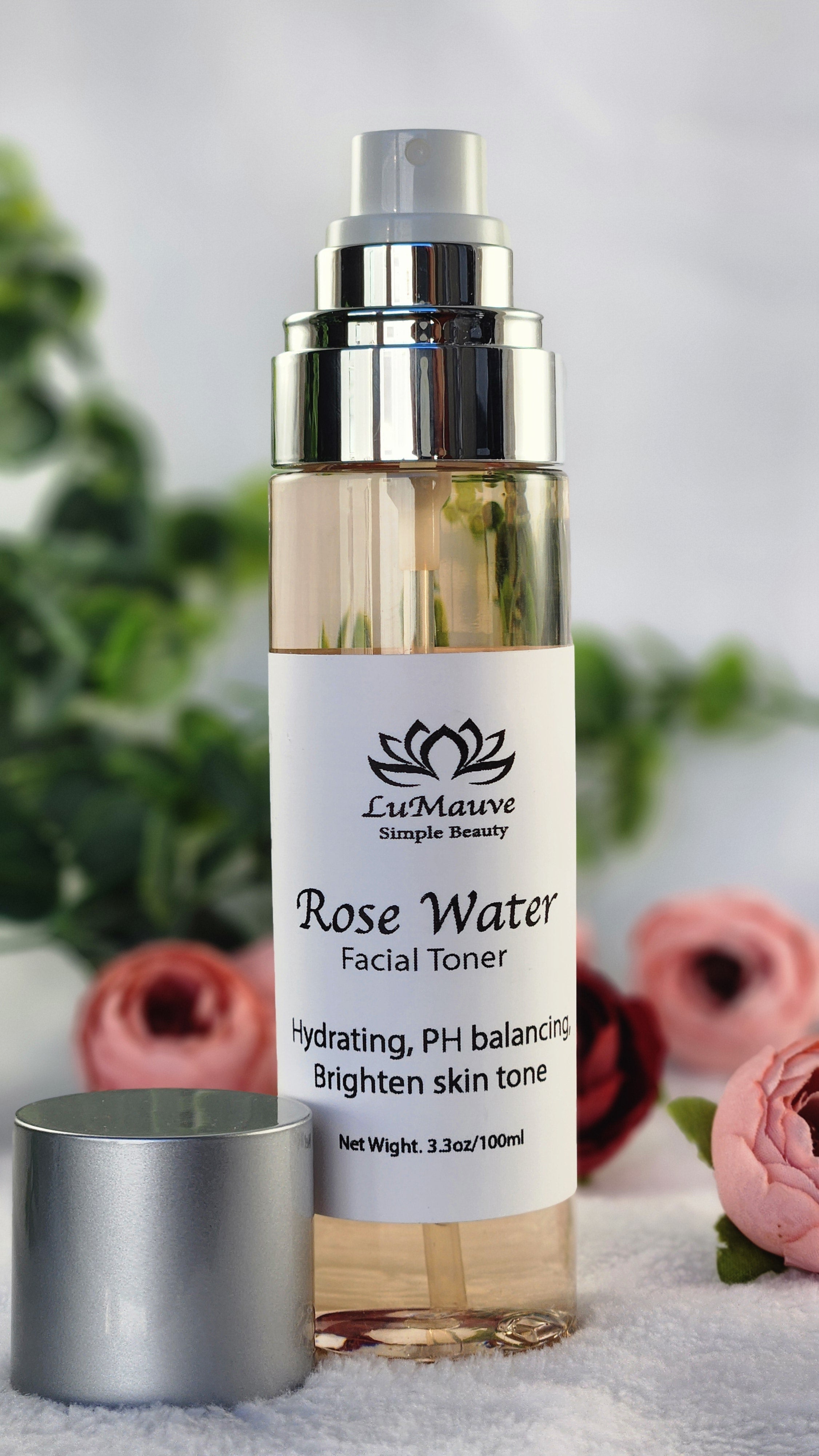 Bottle of rose toner with silver lid